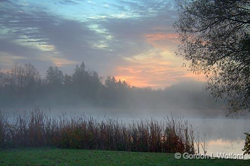 Here Comes The Sun_22721.jpg - Over a misty Scugog River, photographed near Lindsay, Ontario, Canada.